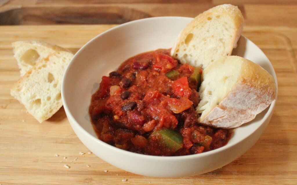 Yummy three bean chili with crusty bread